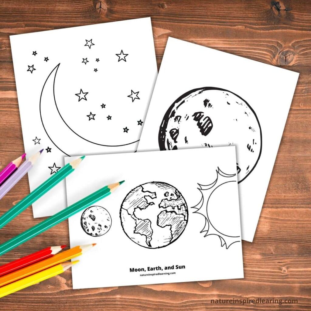 3 moon coloring pages with stars and the sun overlapping on a wooden background with colored pencils on the bottom right side. Realistic moon designs