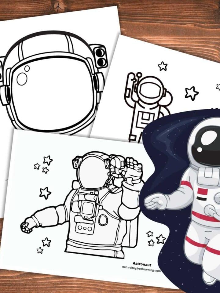 three astronaut coloring sheets overlapping on wooden background with colorful astronaut in a space suit bottom right with dark blue