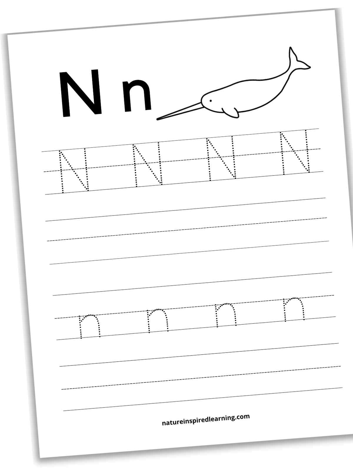 N n in bold next to a narwhal with four sets of lines below. Four dotted N's on the first set then a blank set, four n's on the next set then a blank set of lines.
