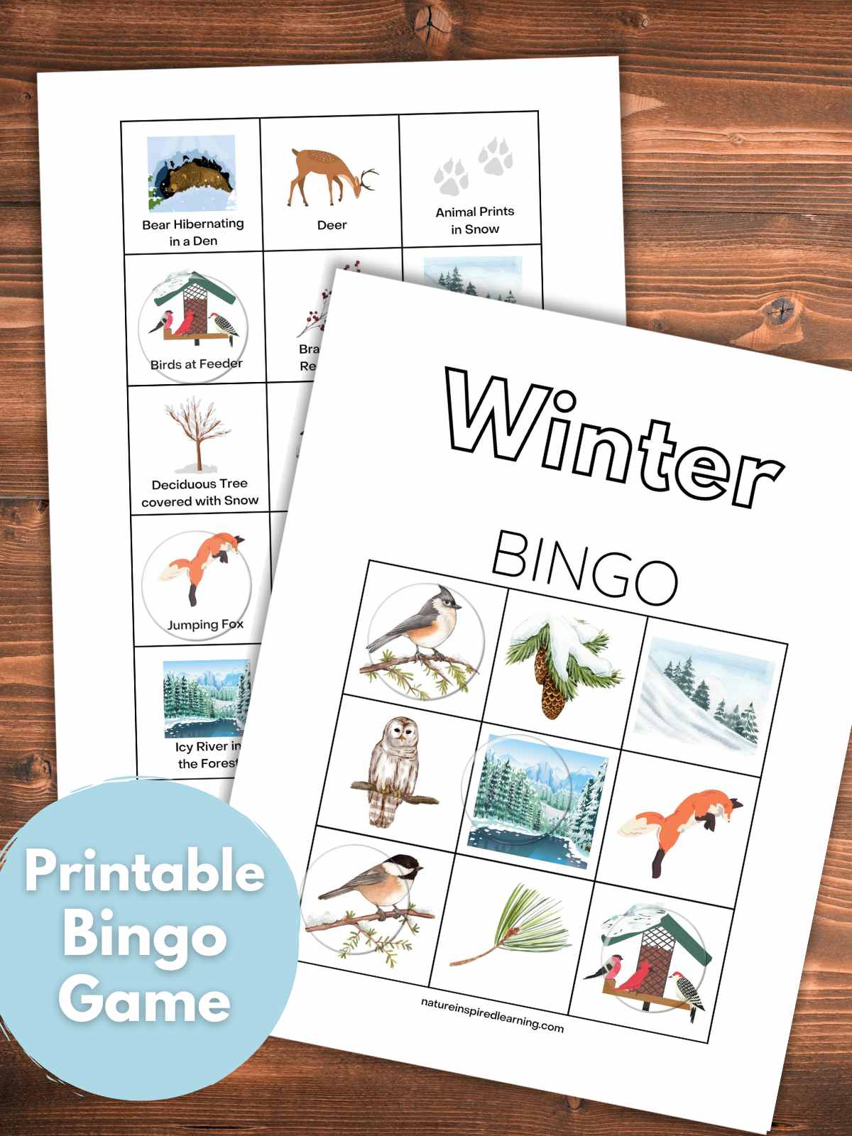 Printable bingo card with winter designs on top of the calling cards on a wooden background with a light blue circle bottom left with text overlay