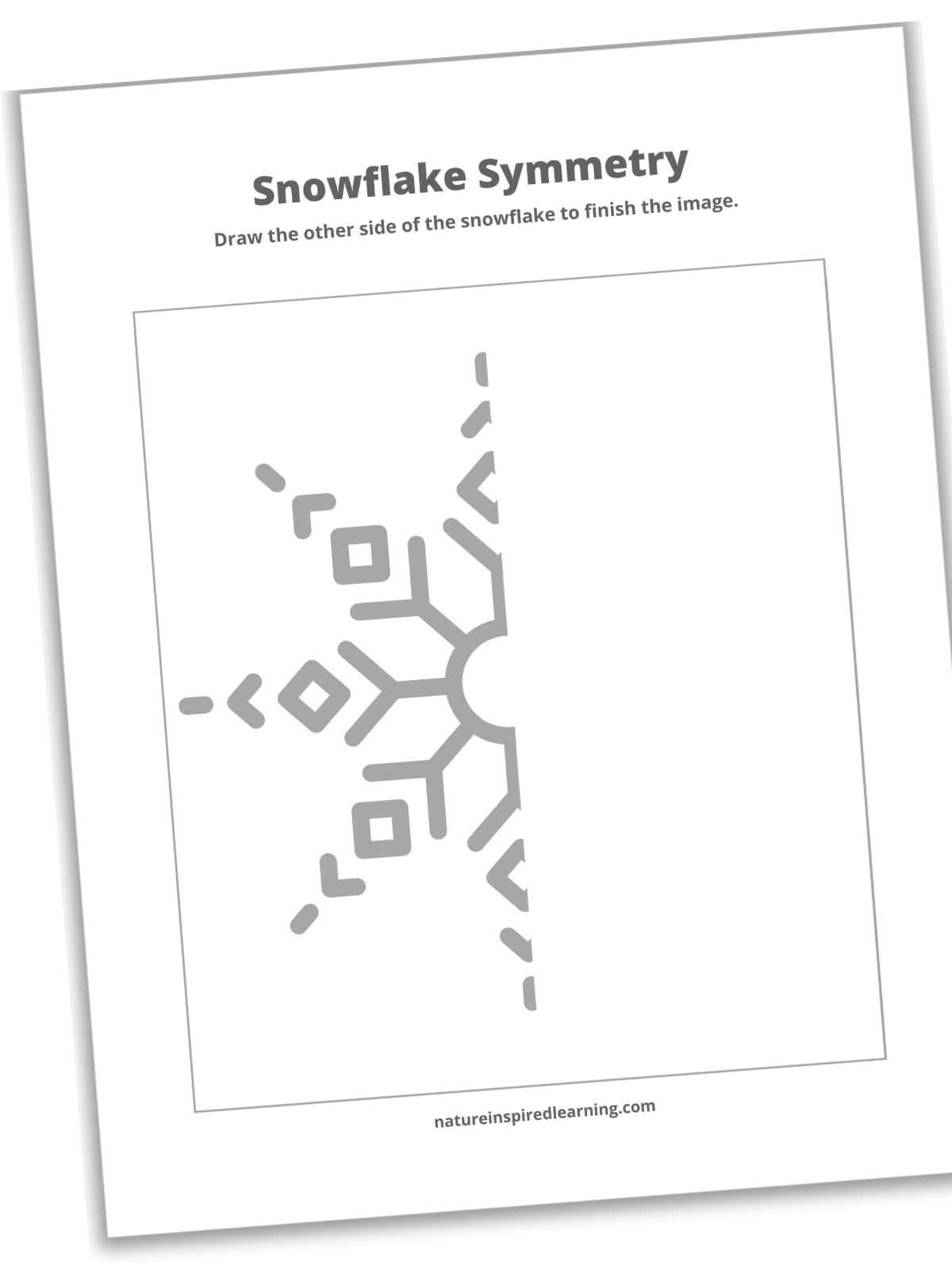 slanted black and white printable with half of a snowflake within a large square