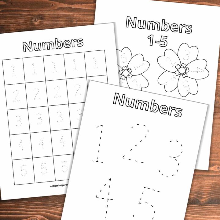 overlapping number worksheets with outlines of numbers one, two, three, four, and five on each sheet on a wooden background.