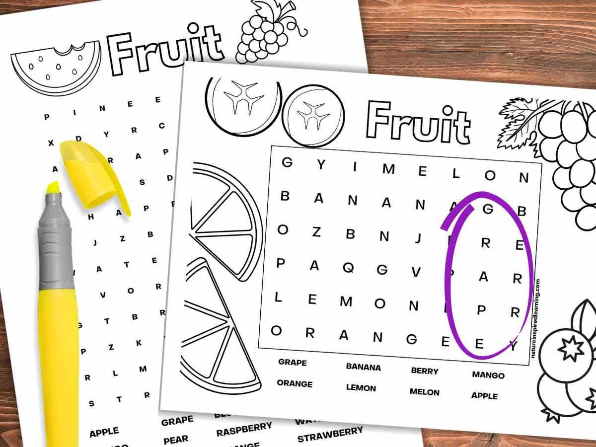 Two printable black and white fruit themed word searches overlapping on a wooden background. A yellow highlighter on the left printable and grape circled in purple on the right printable.
