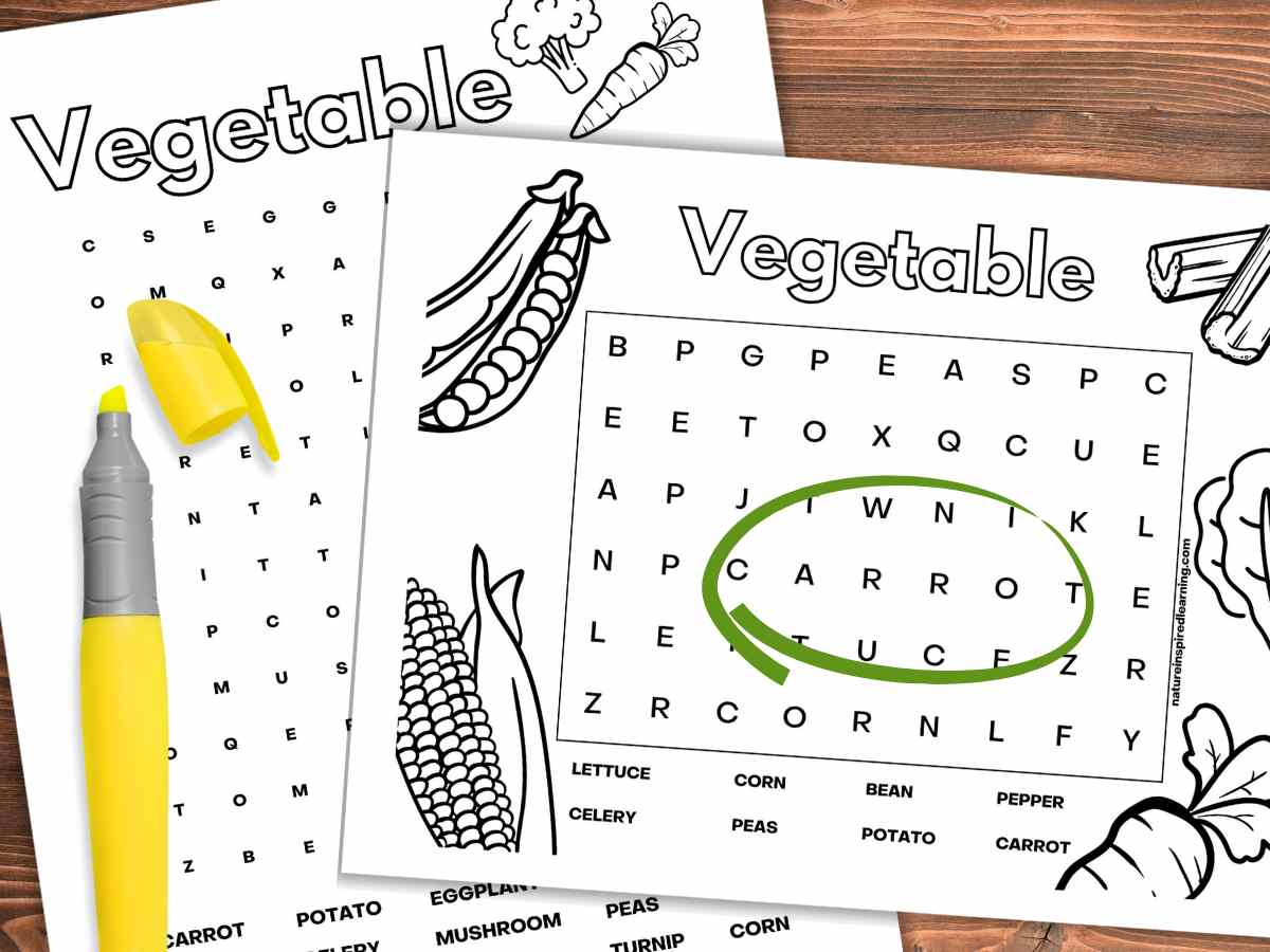 Two black and white vegetable themed word searches overlapping on a wooden background. Carrot circled in green on the right printable and a yellow highlighter with cover on the left.