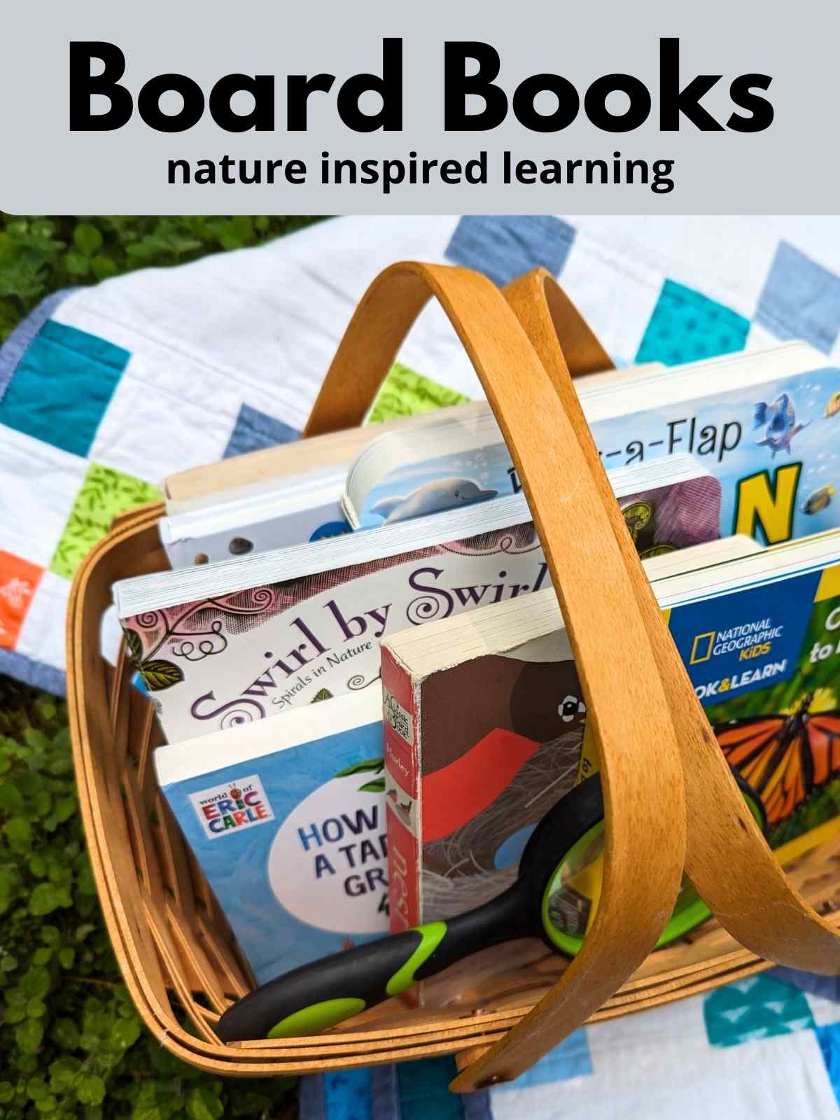 basket filled with brightly colored board books and a magnifying lens on a quilt with blues and whites on green grass. Grey rectangle across the top with black text overlay.