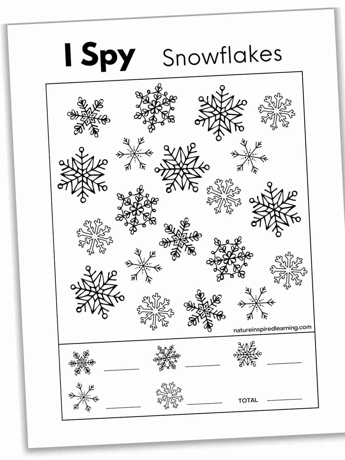 Black and white I spy worksheet with different snowflakes with a key at the bottom.